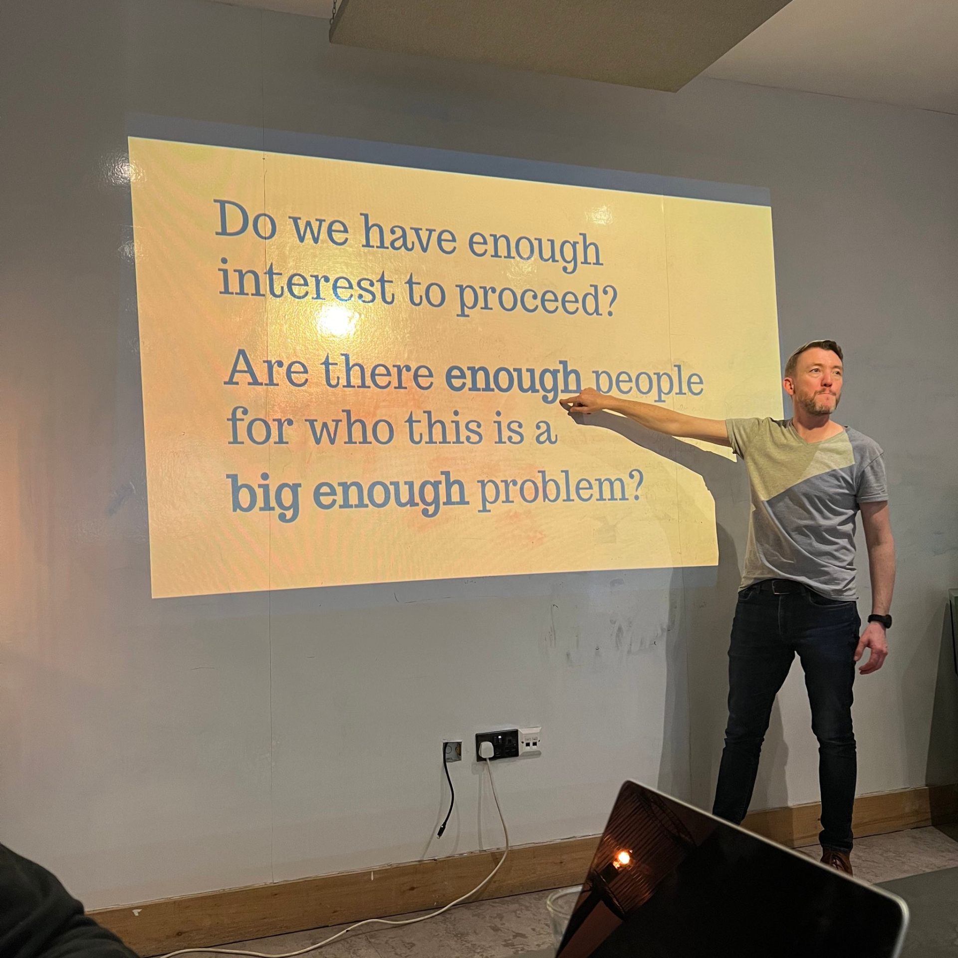 Neil Cocker presenting validation questions during workshop